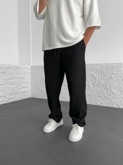 Gerippte Hose – locker sitzende Stretch-Baggy-Hose für Herren mit Kordelzug-Schwarz-S-Chaps Herrenmode