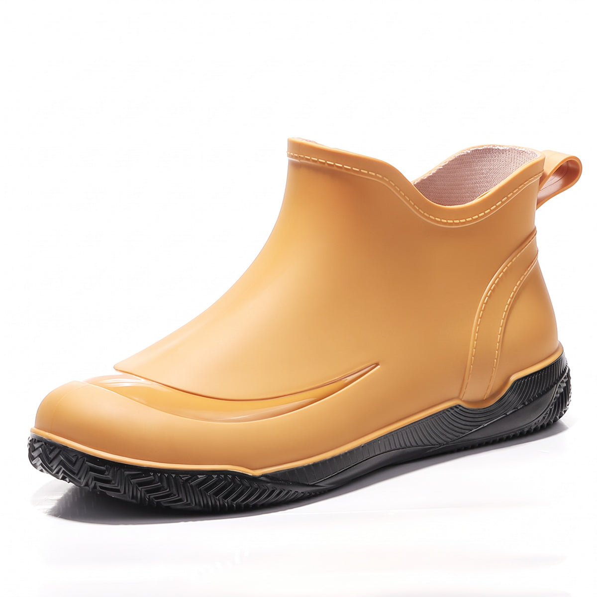 Gelber kurzer Gummistiefel mit schwarzer Profilsohle, Seitenansicht