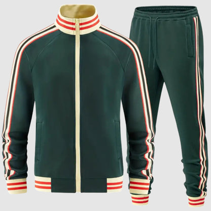 Dunkelgrüne Retro-Trainingsjacke und Hose mit cremefarbenen, roten und schwarzen Kontraststreifen | Chaps Herrenmode