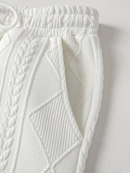 Nahaufnahme von Bund, Kordel und Seitentasche der Jogginghose mit Zopfmuster | Chaps Herrenmode