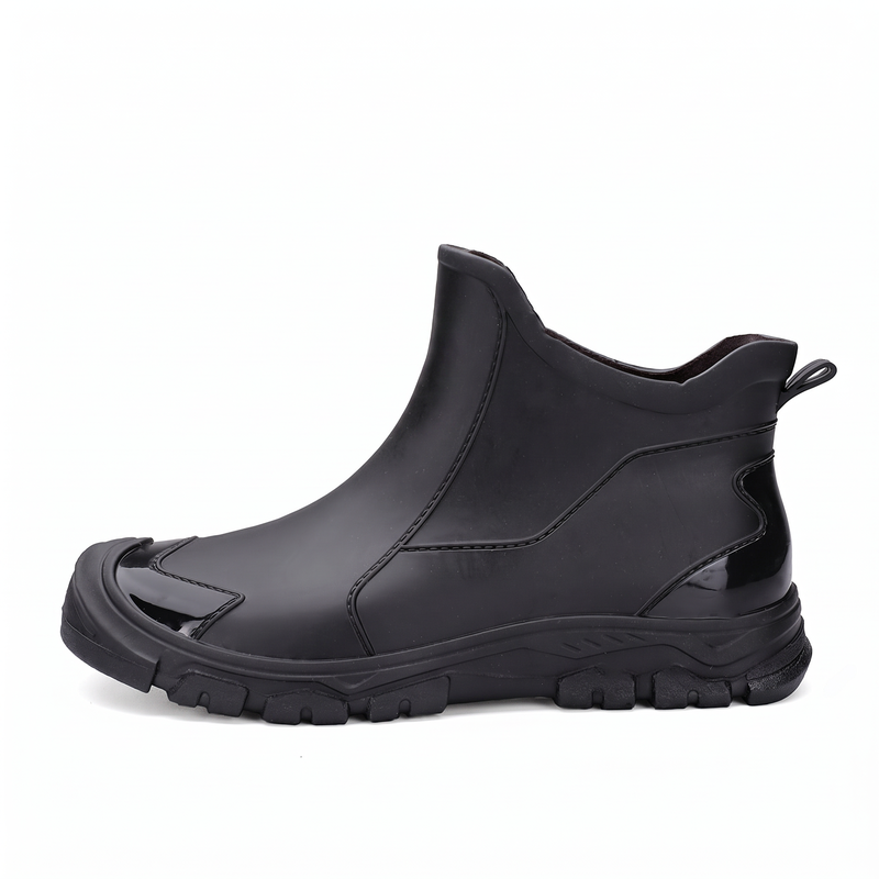 A single black rain boot shown from the side on a white background.